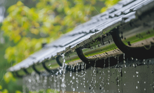How Spring Rain Reveals Weak Seams on Low-Slope Roof Systems